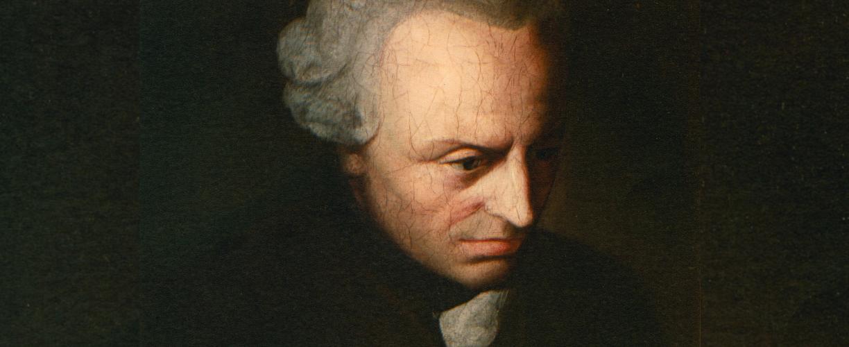 Kuvassa Immanuel Kant tummalla taustalla.
